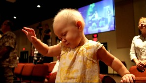 baby praising God